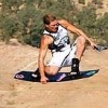 0904181821schwenne-tuck-knee-wakeboarding-wakeskating-photos.jpg